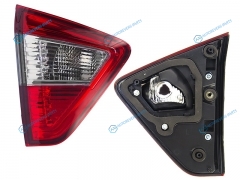ST-215-13T4L Фонарь в крышку багажника NISSAN TERRANO 14- LH