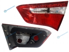 ST-223-13R1R Фонарь в крышку багажника KIA RIO 10-14 4D RH