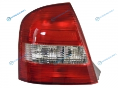 ST-216-1948L Фонарь задний MAZDA FAMILIA323 98-02 4D прав. руль