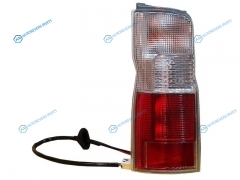 ST-215-19J1L-A Фонарь задний NISSAN CARAVANURVAN 02-09