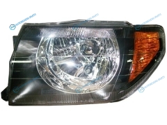 ST-214-1162BL Фара MITSUBISHI PAJERO IO 98-07 LH черная (Евросвет)