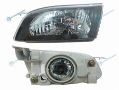 ST-212-1181BL Фара TOYOTA COROLLA 97-00 черный хрусталь