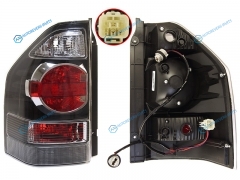 ST-214-1982L Фонарь задний MITSUBISHI PAJERO 03-06 LH чёрный