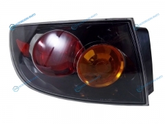 TG-216-1965L-UE Фонарь задний MAZDA 3AXELA 03-06 LH 4D